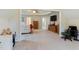 Bright sitting room with access to Primary bedroom, bathroom, and office at 1726 Rapids Ct, Franklinton, NC 27525