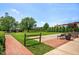 Charming community park in Depot Square offers benches and green space at 173 Grove Township Way, Angier, NC 27501