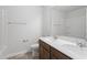 Modern bathroom with double vanity, granite counters, and chrome fixtures at 178 Grove Township Way, Angier, NC 27501