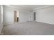 Spacious bedroom featuring plush carpeting and a tray ceiling at 178 Grove Township Way, Angier, NC 27501