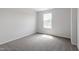 Cozy bedroom featuring a window providing natural light at 178 Grove Township Way, Angier, NC 27501