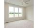 Serene bedroom with a large window and plush carpeting at 1813 Bright Lantern Way, Wendell, NC 27591