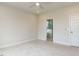 Neutral bedroom with carpet, recessed lighting, and an ensuite bathroom with a glass shower door at 1813 Bright Lantern Way, Wendell, NC 27591