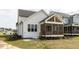This home has an exterior with a screened in porch at 1813 Bright Lantern Way, Wendell, NC 27591