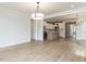 Open-concept living space showing the kitchen, dining and living room at 1813 Bright Lantern Way, Wendell, NC 27591