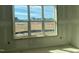Interior view of room with a large window overlooking the lot at 1813 Bright Lantern Way, Wendell, NC 27591