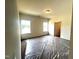 Bright bedroom with two windows and neutral walls, awaiting your personal touch at 19 E American Marigold Dr # 34, Benson, NC 27504