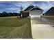 Charming single-Gathering home with a manicured lawn and a freshly power-washed driveway at 19 E American Marigold Dr # 34, Benson, NC 27504