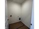 The laundry room has simple hookups and electrical outlets at 19 E American Marigold Dr # 34, Benson, NC 27504