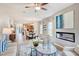 Open-concept living area showcasing stylish furniture and a cozy fireplace at 19 E American Marigold Dr # 34, Benson, NC 27504