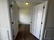 Office or flex space featuring double doors, neutral walls and carpeted floors at 19 E American Marigold Dr # 34, Benson, NC 27504