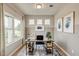 Stylish home office with lots of natural light, modern decor, and a desk with storage at 19 E American Marigold Dr # 34, Benson, NC 27504