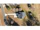 Aerial view of the house and property, showing driveway and outbuildings at 20 Wes Sandling Rd, Franklinton, NC 27525