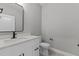 Bathroom with white vanity, hexagon tile floor and modern fixtures at 20 Wes Sandling Rd, Franklinton, NC 27525