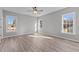 Bright bedroom with hardwood floors and ceiling fan at 20 Wes Sandling Rd, Franklinton, NC 27525