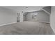 Spacious bedroom features neutral paint, carpet, and a window offering views of the surrounding neighborhood at 20 Wes Sandling Rd, Franklinton, NC 27525