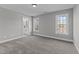 Bedroom with carpet, windows, and ensuite bath at 20 Wes Sandling Rd, Franklinton, NC 27525