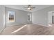 Bright bedroom featuring wood flooring, neutral paint, lots of natural light, and modern trim at 20 Wes Sandling Rd, Franklinton, NC 27525