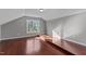 Bonus room with hardwood floors and a large window, offering natural light at 20 Wes Sandling Rd, Franklinton, NC 27525
