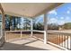 Spacious front porch with a view of the surrounding landscape at 20 Wes Sandling Rd, Franklinton, NC 27525