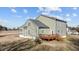Exterior view of a two-story house with a wooden deck at 20 Wes Sandling Rd, Franklinton, NC 27525