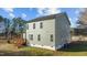 Exterior view of a two-story house with a wooden deck at 20 Wes Sandling Rd, Franklinton, NC 27525