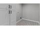 Laundry room featuring tiled floors and ample built-in storage at 20 Wes Sandling Rd, Franklinton, NC 27525