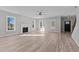 Spacious living room with hardwood floors, fireplace, and lots of natural light at 20 Wes Sandling Rd, Franklinton, NC 27525
