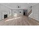 Spacious living room with hardwood floors, fireplace, and lots of natural light at 20 Wes Sandling Rd, Franklinton, NC 27525