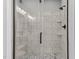 Modern shower with marble tile and glass enclosure at 20 Wes Sandling Rd, Franklinton, NC 27525