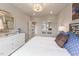 Polka dot bedroom with a white dresser and blue accents at 204 E Fountainhead Ln, Garner, NC 27529