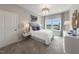 Bright bedroom with a comfortable bed and plenty of natural light at 204 E Fountainhead Ln, Garner, NC 27529