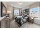 Cozy bedroom with a comfortable bed and window views at 204 E Fountainhead Ln, Garner, NC 27529