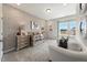 Charming bedroom with a crib and a stylish dresser at 204 E Fountainhead Ln, Garner, NC 27529