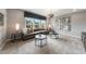 Bright bonus room with a gray couch and two coffee tables at 204 E Fountainhead Ln, Garner, NC 27529