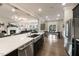 Open concept kitchen features a large island and stainless steel appliances at 204 E Fountainhead Ln, Garner, NC 27529