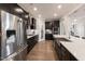 Modern kitchen with stainless steel appliances and an island at 204 E Fountainhead Ln, Garner, NC 27529