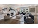 Spacious living room with fireplace and comfortable seating at 204 E Fountainhead Ln, Garner, NC 27529