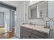 Bathroom with vanity, sink, and large mirror at 2041 Grassy Creek Virgilina Rd, Oxford, NC 27565