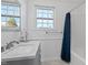 Clean bathroom with a tub, shower, and updated vanity at 2041 Grassy Creek Virgilina Rd, Oxford, NC 27565