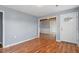 Living room with hardwood floors and gray walls at 2041 Grassy Creek Virgilina Rd, Oxford, NC 27565
