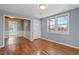 Living room with hardwood floors and access to other rooms at 2041 Grassy Creek Virgilina Rd, Oxford, NC 27565