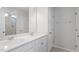 Elegant bathroom features a double sink vanity with modern fixtures and a walk-in shower at 211 Grove Township Way, Angier, NC 27501
