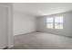 Spacious bedroom with neutral carpet and double windows offering natural light at 211 Grove Township Way, Angier, NC 27501