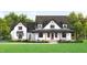 Two-story farmhouse with white siding, dark roof, and a covered front porch at 22 Slocum Dr, Wendell, NC 27591