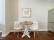 Small dining area with wood flooring and a round table at 2221 Valley Edge Dr # 105, Raleigh, NC 27614