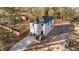 Modern two-story house with a gray exterior and a detached garage at 2513 Rochelle St, Durham, NC 27703