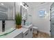 Elegant bathroom with a double vanity and glass vessel sinks at 2513 Rochelle St, Durham, NC 27703