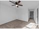 Spacious bedroom with carpet flooring and ceiling fan at 2513 Rochelle St, Durham, NC 27703