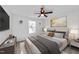 Main bedroom with a king-size bed and large window at 2513 Rochelle St, Durham, NC 27703